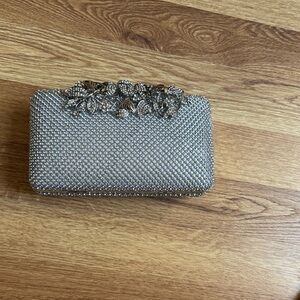 Chic Silver Clutch with Floral Detail